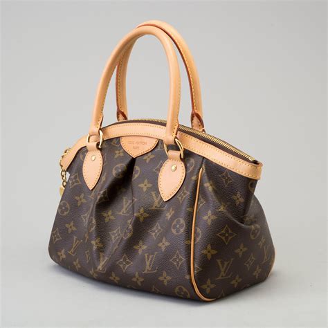 louis vuitton tivoli pm size|Louis Vuitton pm vs gm.